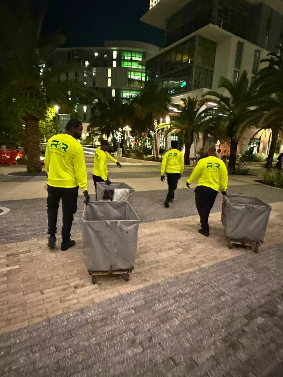 Uniformed cleaning technician on a commercial job